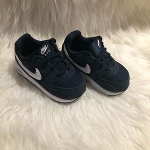 Blue and white Nike
